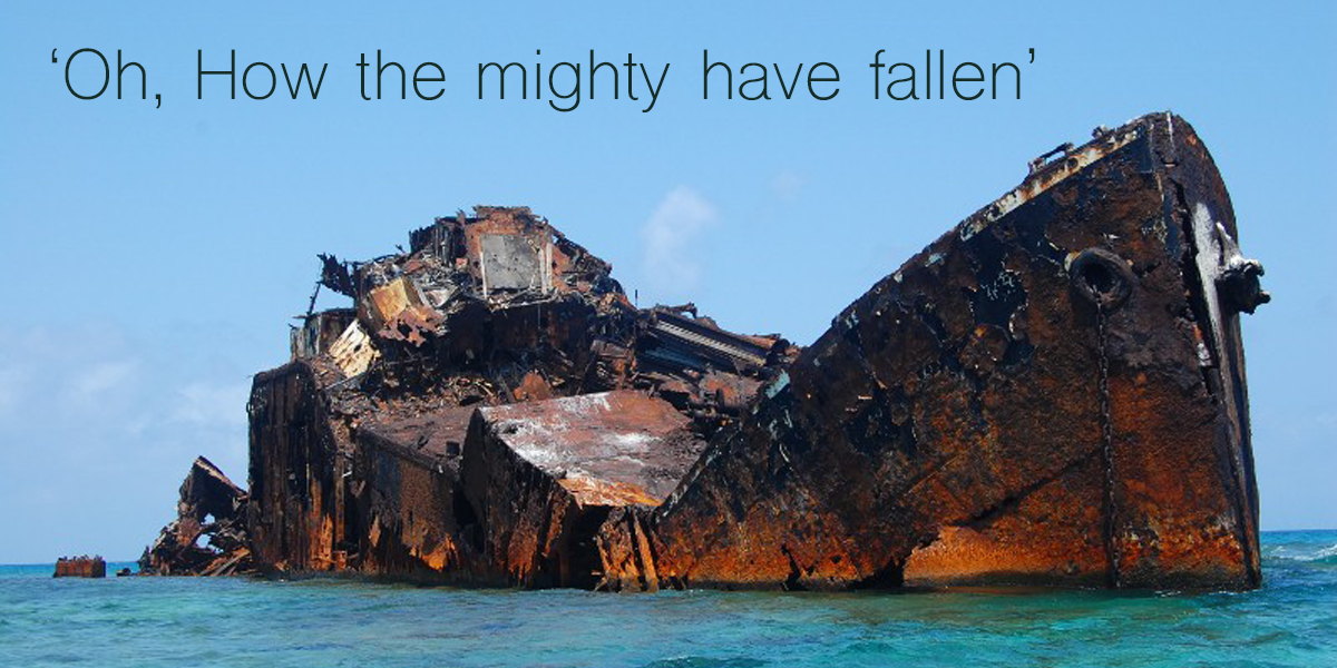 a large ship wreck with the test 'Oh, How the mighty have fallen' above